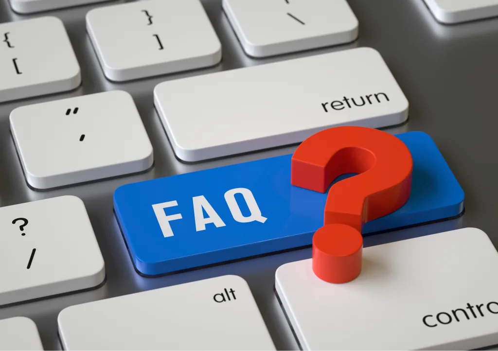 Tasto FAQ su una tastiera, con un punto interrogativo